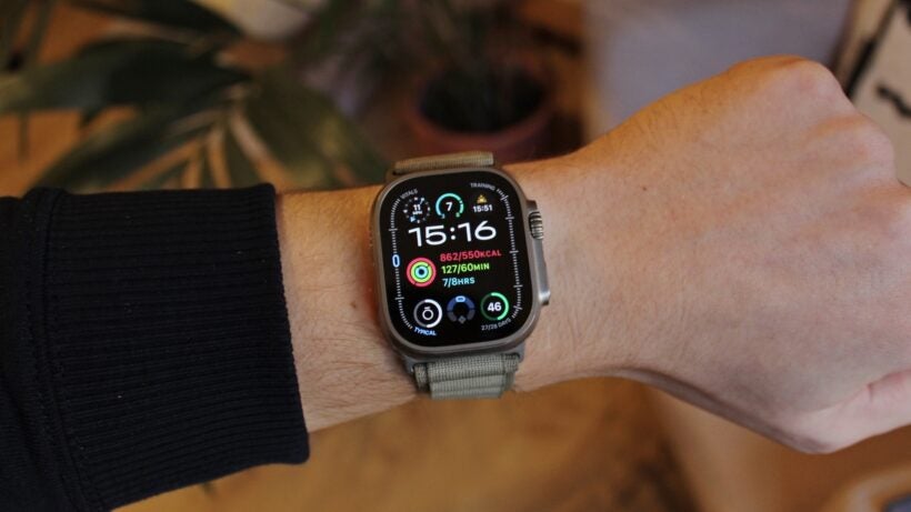 outdoor tracker on male wrist showing activity stats